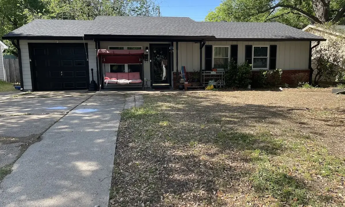 Roof Replacement crew at work on a residential roof in Rolesville